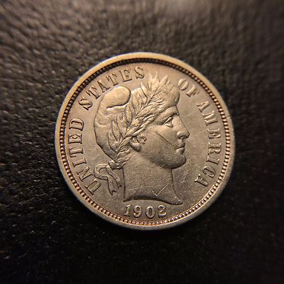 1902 Barber dime lamination error showing surface peeling and silver layer separation